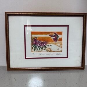 “Ruby Throated Humming Bird" by the artist Gerry Johnson.